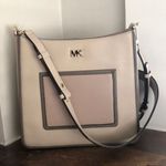 Michael Kors  Gloria oatmeal swing pack crossbody new with tags Photo 0