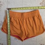 Under Armour  heat Gear Women's Vibrant Orange Athletic Shorts Photo 4