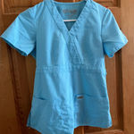 Grey's Anatomy  professional wear scrub top in blue size xsmall Photo 0