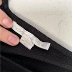 Cooper and Ella 🦋  Black Fringe Sleeve Cold Shoulder Top Snake Embossed Blouse Photo 3