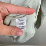 Universal Standard  Light Gray Jersey Turtleneck‎ In Mineral Grey Photo 6