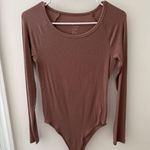 A New Day  Long Sleeve Bodysuit Photo 0