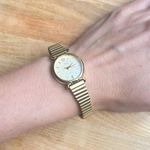 Timex Ladies Watch Vintage Gold-Tone Stainless Steel Stretch Band and Dial Photo 4