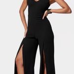 Bebe  Women's XL Black V-Neck Jumpsuit with Open Leg Slits Photo 0