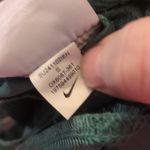 Nike  green standard fit golf shorts size small Photo 5