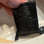 Cachet Cream Peplum Dress with Rhinestone Detail Photo 7