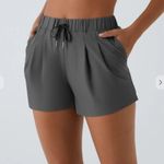 Halara Mid Rise Elastic Waistband Drawstring Ruched Side Pocket Casual Shorts 3" Photo 0