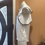 Q&A  beige and black flowy top Photo 2