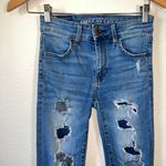 American Eagle  - AEO Light Wash Distressed Super Stretch Hi Rise Jegging Jeans Photo 1