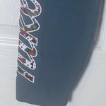 Nike Women’s Sportswear Femme Floral Logo 7/8 Teal Leggings Photo 6