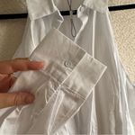 L'Agence L’agence NWOT Women’s White Cold Shoulder Blouse Size L Photo 12