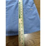 FIGS  Technical Collection Scrub Top Womens V Neck Blue Size x Small Pocket Nurse Photo 3