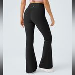 Halara  Crossover High Waisted Back Pocket Super Flare Leggings Photo 2