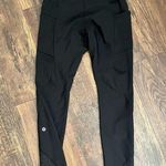 Lululemon  Size 6 Black Tight Stuff Legging Reflective Dots At Ankles Pockets Photo 0