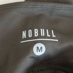 Nobull  high rise biker shorts olive green medium 6” Photo 8