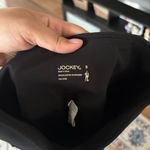 Jockey Black Premium Utility 7/8 Length Leggings with Side Pockets Mid Rise NWT Photo 4