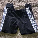 PINK - Victoria's Secret Pink Victoria’s Secret sweatpants joggers purple and black size medium Photo 3