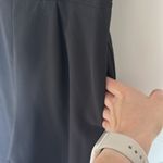 The Vintage Shop Adorable, sleeveless black jumpsuit, one leg with pocket size large Photo 2