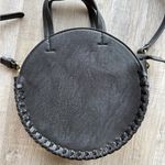 Free People  Round Vegan Leather Crossbody Bag in Black Photo 1
