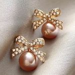 Delicate Bow With Imitation Pearl Design Stud Earrings Photo 2