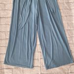 Women M sleeveless wide leg Flowy jumpsuit w/tie belt blue Size M Photo 1