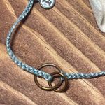 Pura Vida Interlocking Rings Bracelet – Light Blue Braided Cord w/ Pouch Photo 1