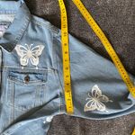 The Style Between Us Women's Light Blue Denim Jacket with Butterfly Embroidery Photo 10