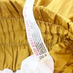 Free People  Movement The Way Home High Waisted Shorts in Gold Photo 7