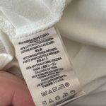 Free People  Rally Tank Top Ivory Peplum Perforated Racerback Tennis Size Small Photo 5