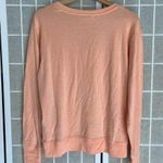 Athleta NWT  Sunrise V neck Sweatshirt Medium peachy orange color thumb holes Photo 4