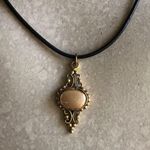 Unbranded Gold Tone Pendant Taupe Stone Waxed Black Cord Pendant Necklace Photo 3