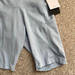 Nike Dri-Fit High Waisted 8” Blue Biker Shorts With Pockets Sz XS NWT Photo 3