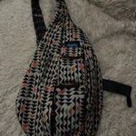 KAVU  Sling Bag Backpack w/Adjustable Rope Strap Diamond Print Multiple Pockets Photo 0