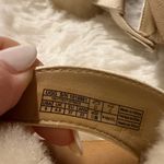 UGG  Cream and Tan Sheepskin Sandals Photo 9