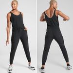 Athleta Unbound Jumpsuit Athletic Romper Yoga Sporty Travel in Black Size L Photo 1
