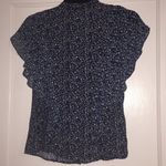 simply styled Woman’s Ruffle Crop Button Down Top Photo 4
