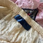 Blue Rain Floral Patterned Shorts with Pink and Yellow Tones Photo 3