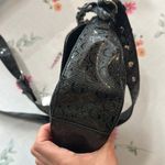 Guess Black Quilted floral Crossbody Bag with cheetah lining and bag charm Photo 6