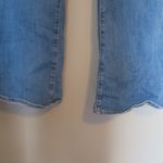 American Eagle Outfitters next level stretch super hi-rise flare jeans in medium wash blue size 4. Photo 6