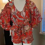 MINKPINK Burnt orange and White Floral Jumpsuit
Size: XS Photo 1