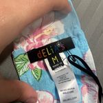 Dolls Kill  Delias Beach Floral Top Photo 1