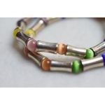 Source Unknown Ultramodern Set of 2 Multi Color Cat Eye Beads Silver Tone Tube Stretch Bracelet Photo 2