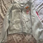 Sanrio  Light Blue Hoodie with Colorful Heart Design Photo 0