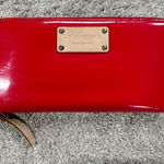 Kate Spade Women’s Red Patent Leather Zip Around Wallet Photo 0