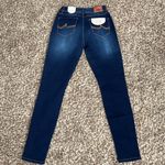 California vintage Dark Wash Mid Rise Distressed Skinny Jeans Photo 7