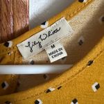 Lily White  Yellow Polka Dot Short Sleeve Tee Photo 2