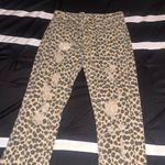 Mittoshop Ripped Leopard Print Pants Photo 1