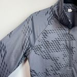 Under Armour  Womens Heat Gear Fitted 1/2 Zip Pull Over Allover Print Gray Medium Photo 3