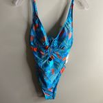 Kenneth Cole NWT Women’s size small key hole plunge one piece Photo 1