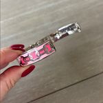 Halcyon Days Chain enamel hinged bangle in a pink and gold colorway. Silver Photo 3